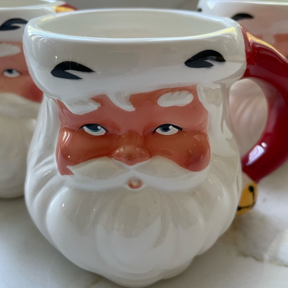 Vintage 1986 Avon Jolly Santa Claus Ceramic Mugs with Red Handle.